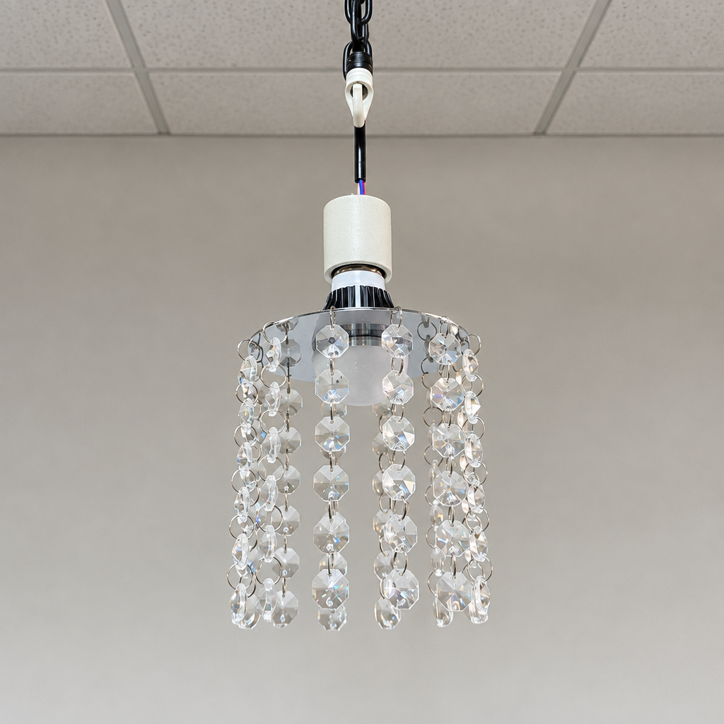 Compact crystal chandelier bulb shown installed