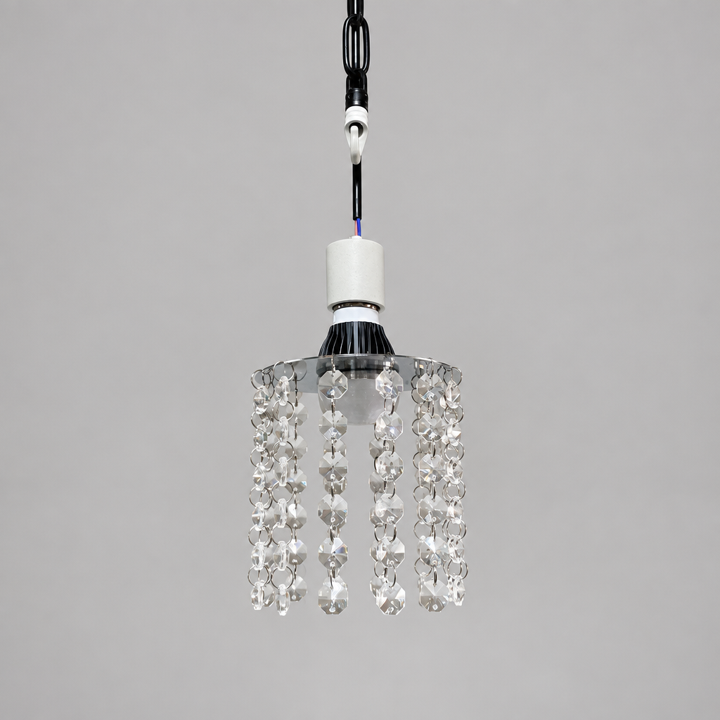 E27 crystal chandelier bulb installed in a socket
