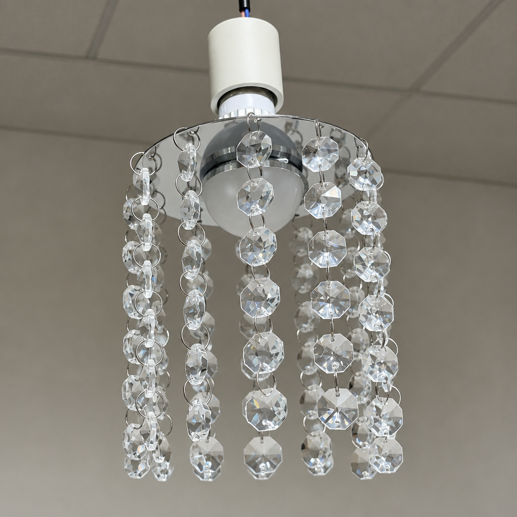 Crystal chandelier bulb switched off showing diffuser and crystal details