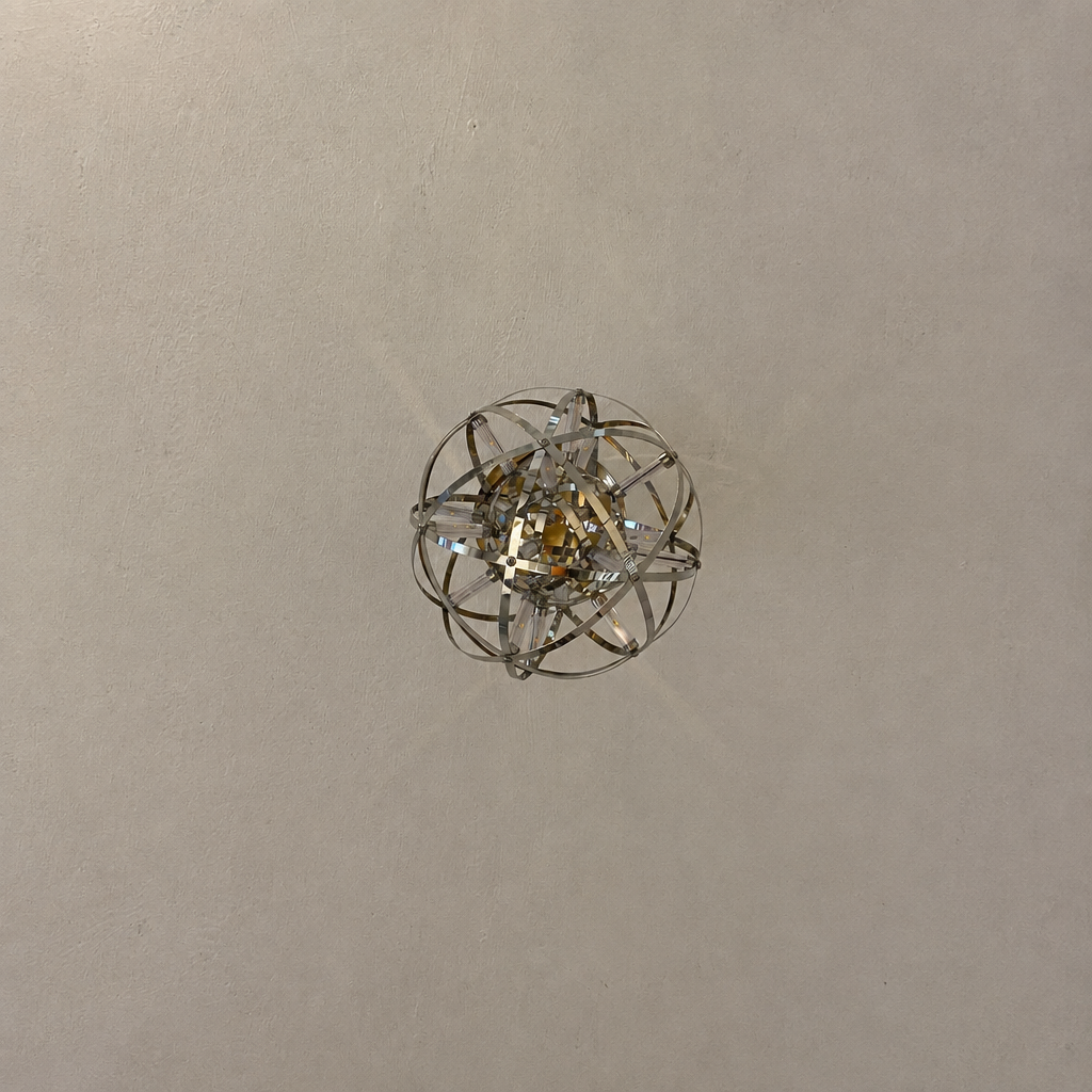 Atom sphere wall sconce lit, cropped square, top-down view